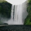 Green grass and moss at Skogafoss waterfall in South Iceland